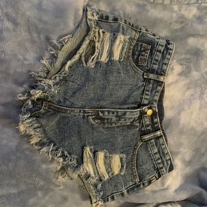 Distressed dark jean shorts, a bit high waisted